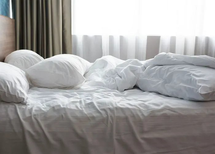 white bed sheets