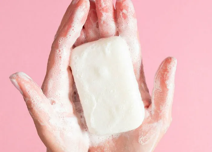 bar soap in someones hands