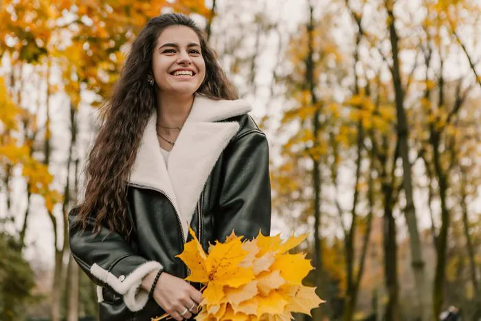"Cozy autumn outfit featuring a sweater and denim jacket"