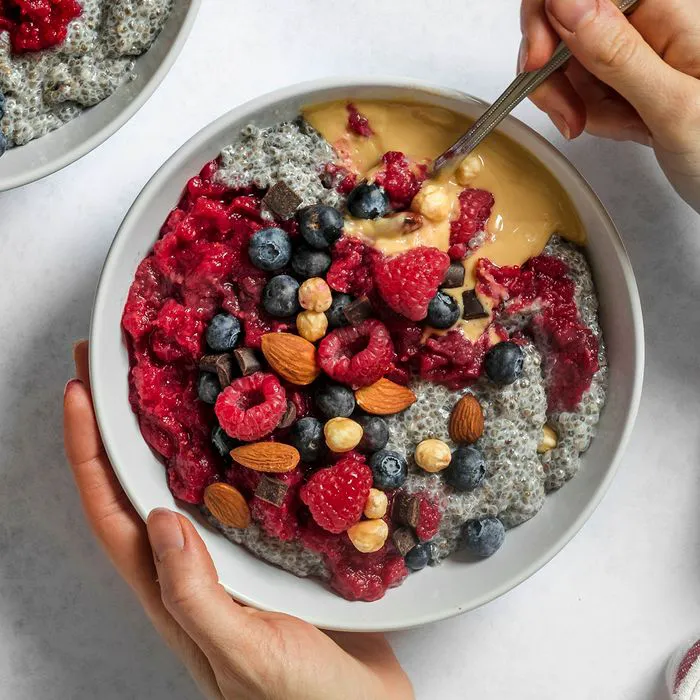 "Chia pudding with raspberries and nuts"