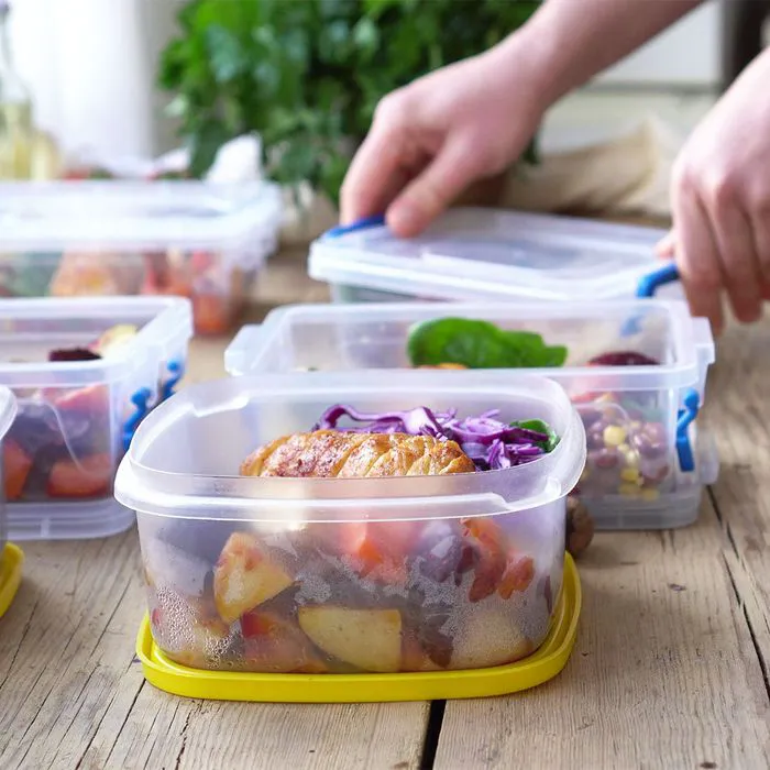Organized meal-prepped lunch containers ready to eat.