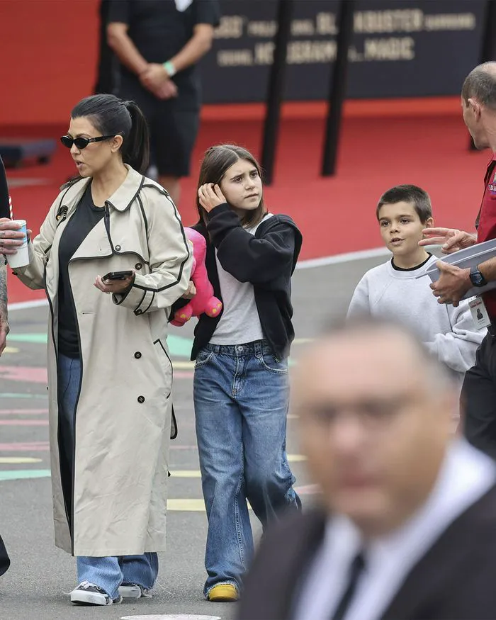 Kourtney Kardashian enjoying time at Luna Park with Penelope and Reign.