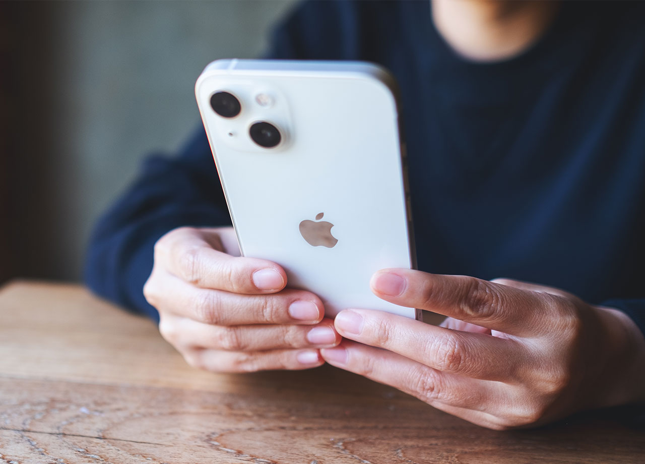 woman-using-white-iphone