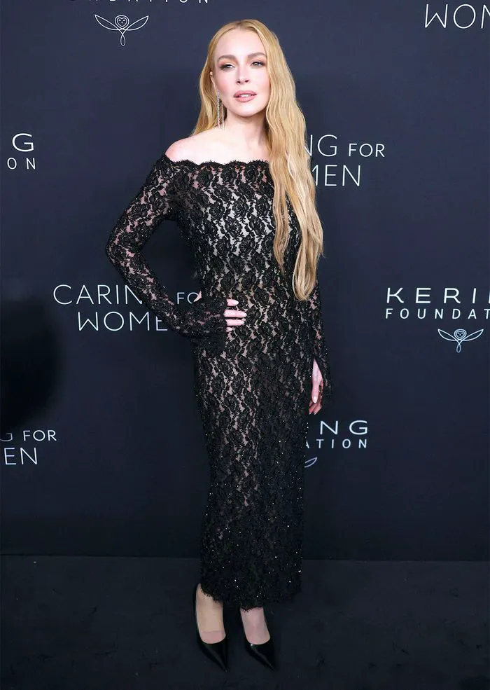 Lindsay Lohan attends the Kering "Caring For Women" dinner.