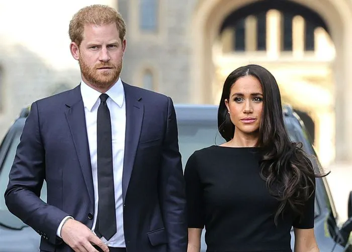 Meghan Markle and Prince Harry at Windsor Castle honoring Queen Elizabeth.