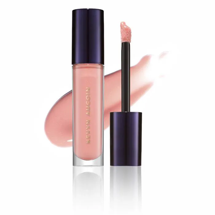 "Celestial Lip Gloss swatches on skin"