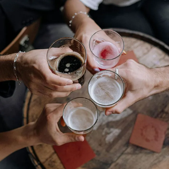 people cheersing beer