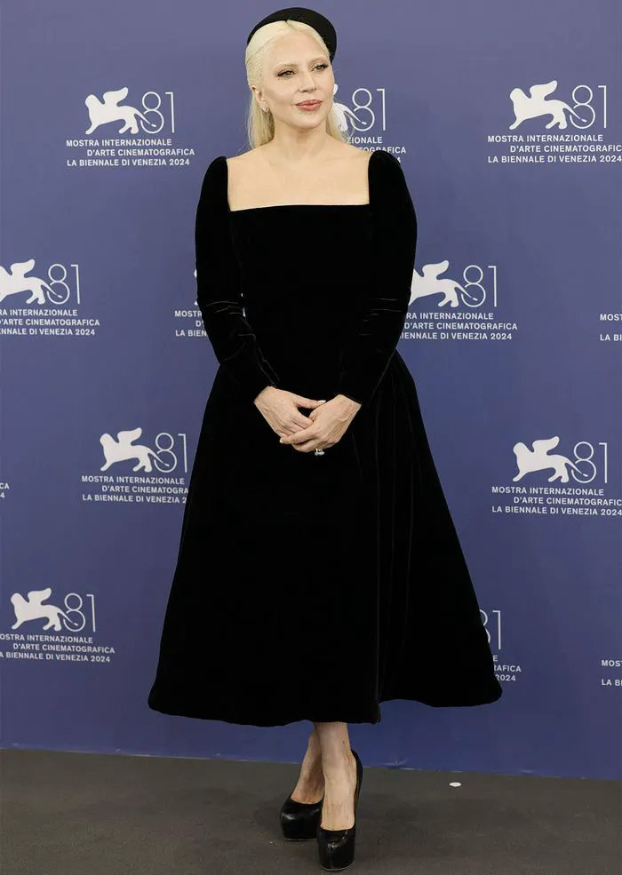 Lady Gaga arriving at the Venice Film Festival photocall in stunning outfit.