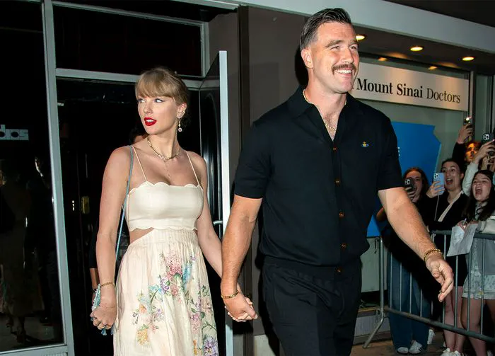 Taylor Swift and Travis Kelce at Karen Elson's wedding in NYC.