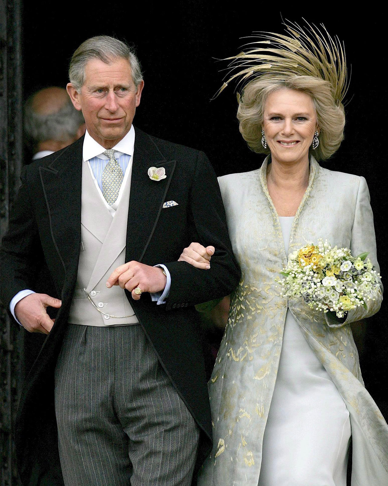 King Charles and Queen Camilla leave St Georges Chapel following the blessing of their wedding