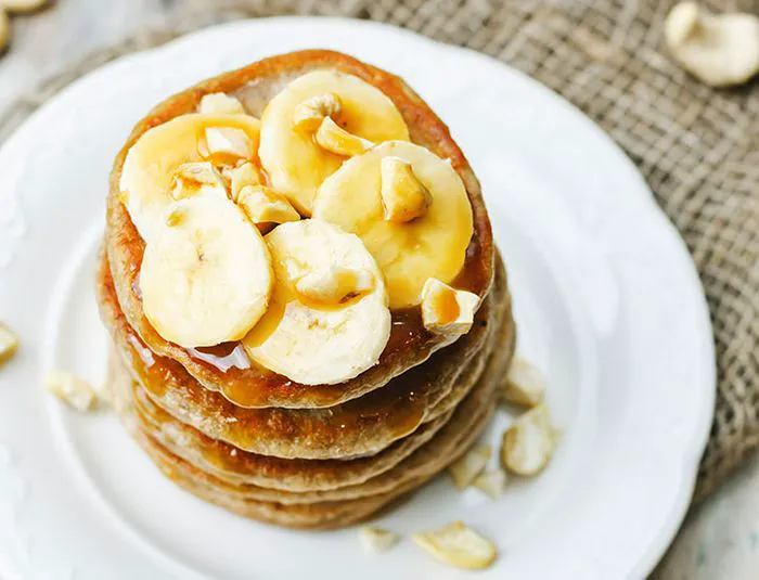 Delicious stacked banana pancakes ready to serve.