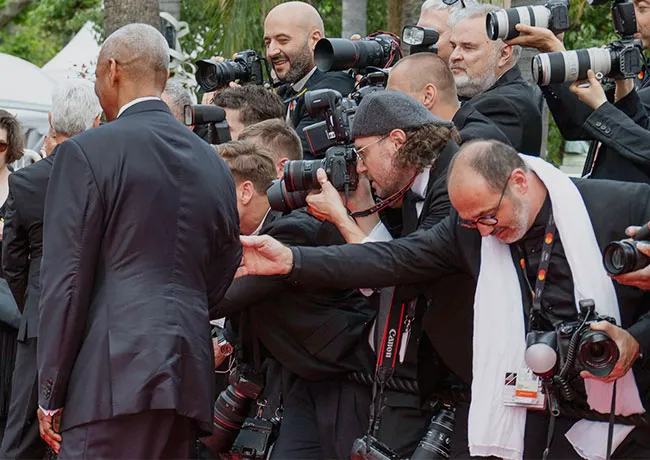 Denzel Washington touched by photographer Highest 2 Lowest premiere Cannes Film Festival