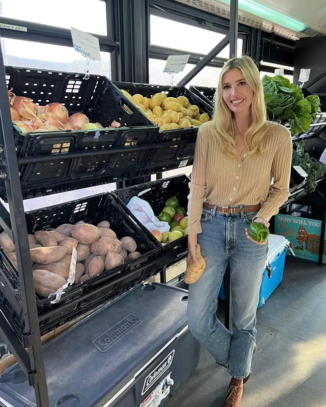 Ivanka Trump promoting fresh produce at a market event.