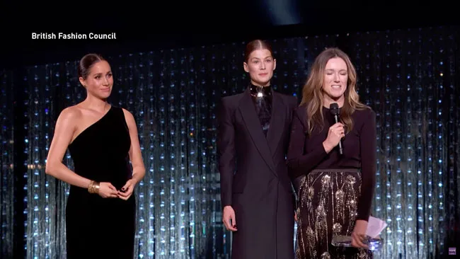 Meghan Markle presenting award to Clare Waight Keller At The 2018 British Fashion Awards
