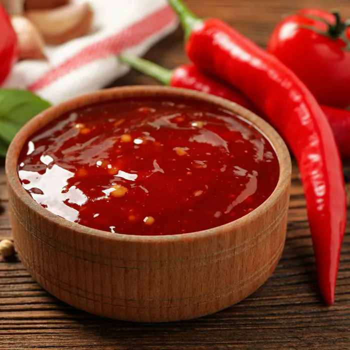 Bottle of sweet chili sauce on display.