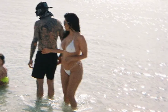 Kourtney Kardashian and Travis Barker enjoying a vacation together