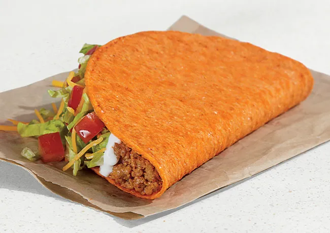 Doritos Locos Tacos Supreme from Taco Bell featuring nacho cheese