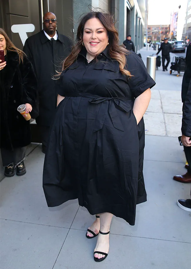 Chrissy Metz black dress outside Disney in New York