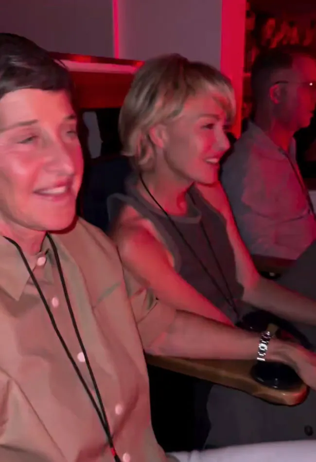 Ellen DeGeneres and Portia de Rossi at Billie Eilish concert.