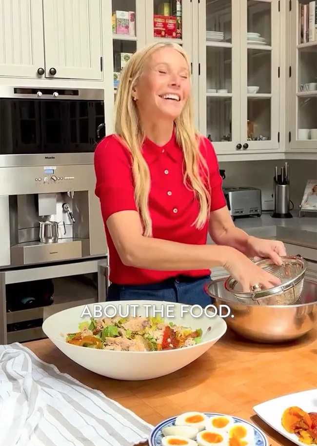 Gwyneth Paltrow making salad with her hair down