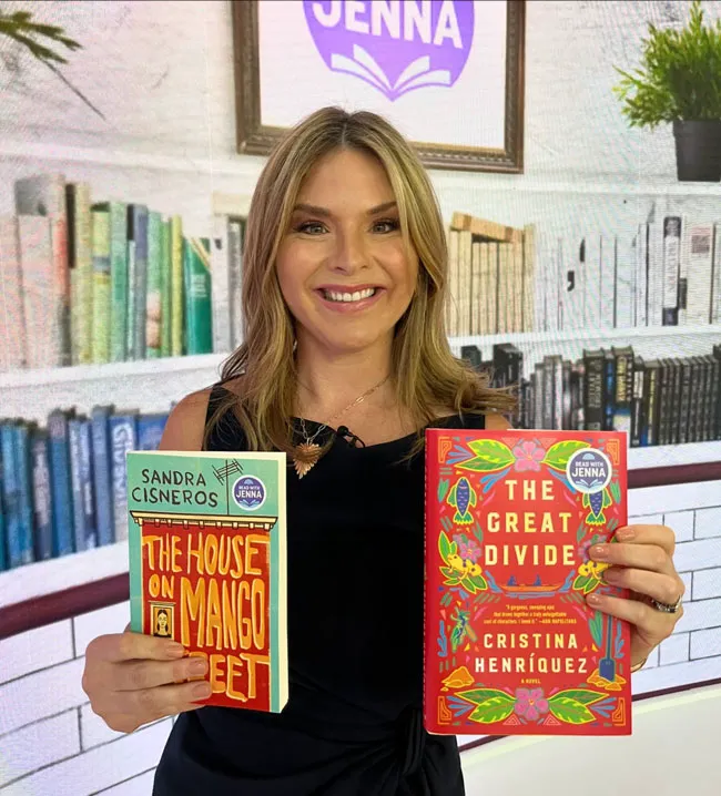 Jenna Bush Hager holding up books