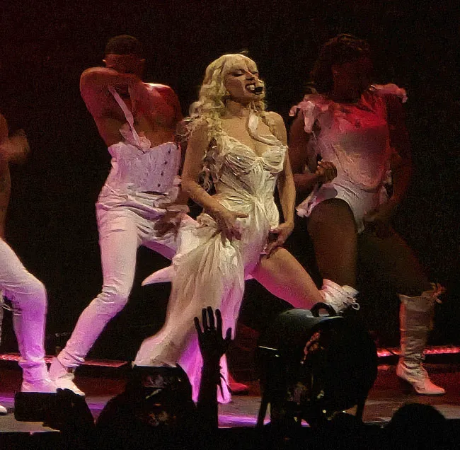 "Lady Gaga performing in a gauze corset at Mayhem Ball"