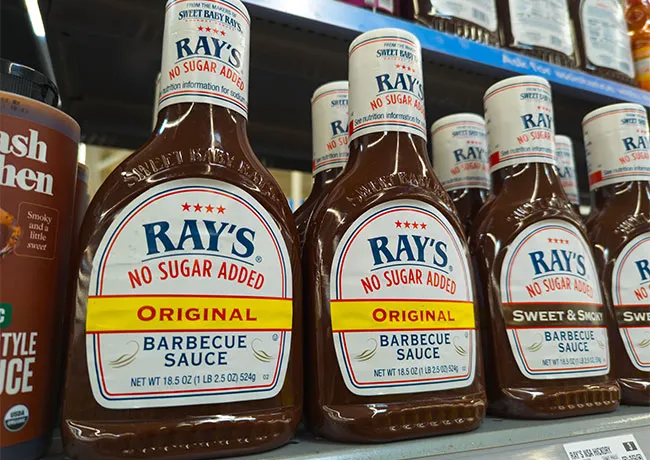 No-sugar-added Rays barbecue sauce bottle for healthier grilling options.