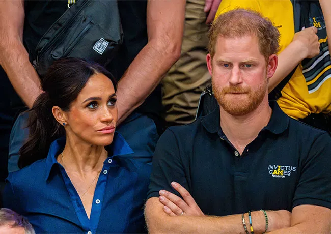 Prince Harry Meghan Markle not smiling Invictus Games