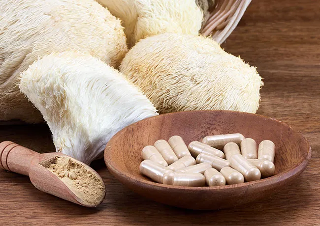 Lion's mane mushrooms with supplements and powder.