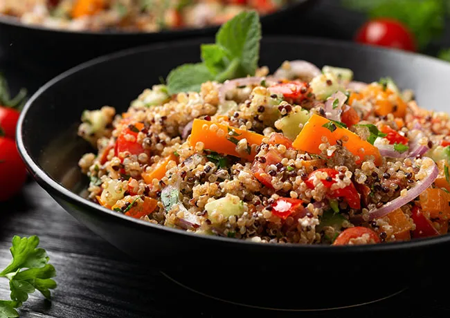 Colorful quinoa vegetable salad packed with nutrients.