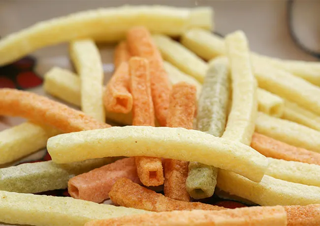 Healthy veggie straws in a colorful bowl