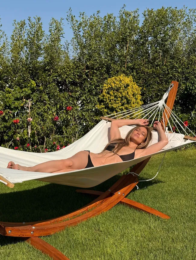 Jennifer Lopez relaxing in a bikini on a hammock in Egypt.