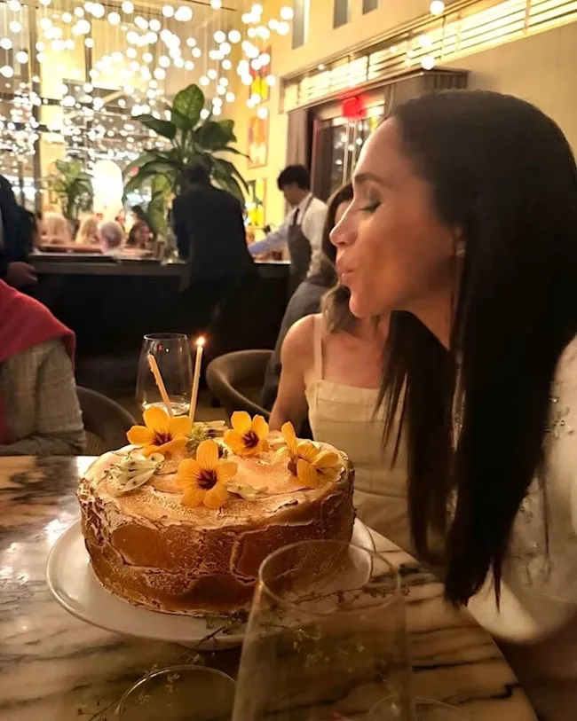 Meghan Markle blowing out birthday candles