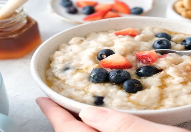 Healthy oatmeal bowl topped with fresh berries