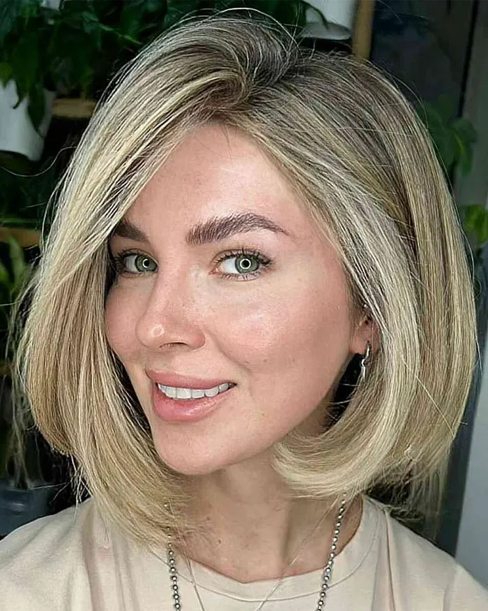 Face-framing bob hairstyle showcasing soft layers by Pirania Ya