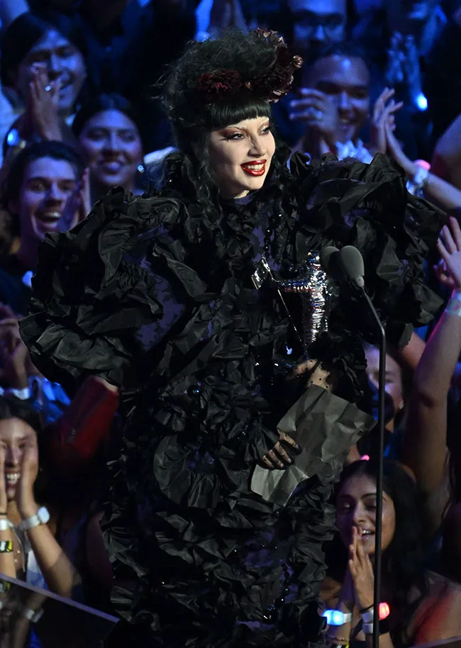 "Lady Gaga at the 2025 MTV VMAs in a gothic gown"