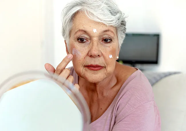 woman-moisturizing-skin