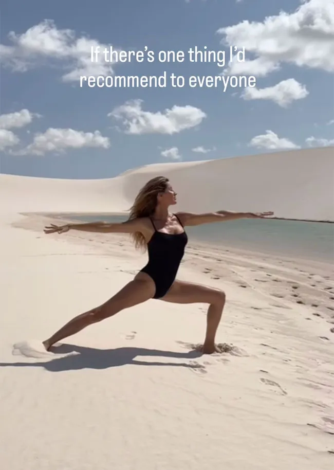 Gisele Bundchen black swimsuit beach yoga