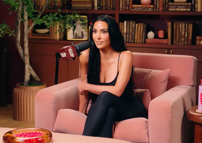Kim Kardashian on the Call Her Daddy podcast discussing her fashion choices.