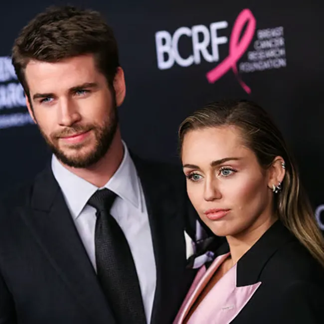 "Taylor Swift and Travis Kelce at a public event"