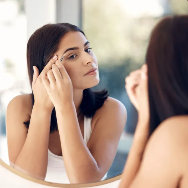 Close-up of luxurious beauty products on a vanity.