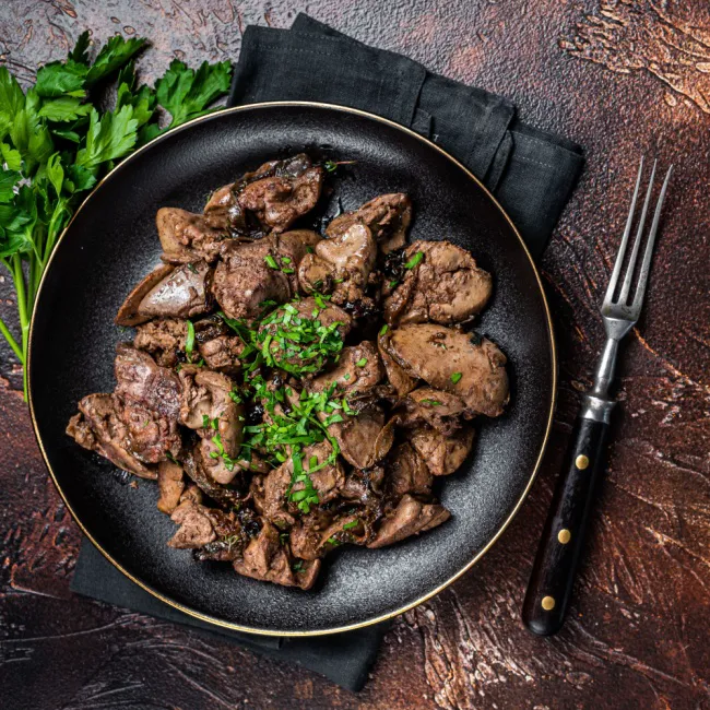 "A close-up of grass-fed red meat on a cutting board"