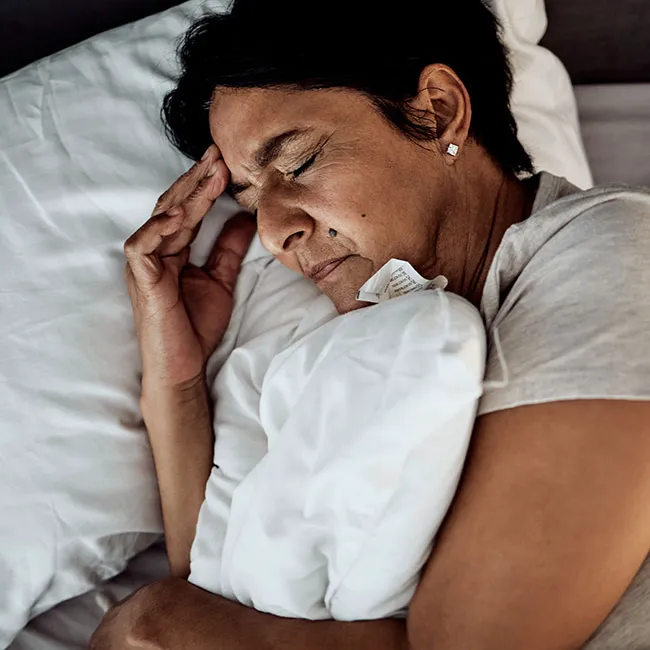 menopausal woman struggling to sleep