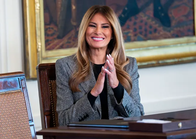 Melania Trump signing the Fostering the Future executive order