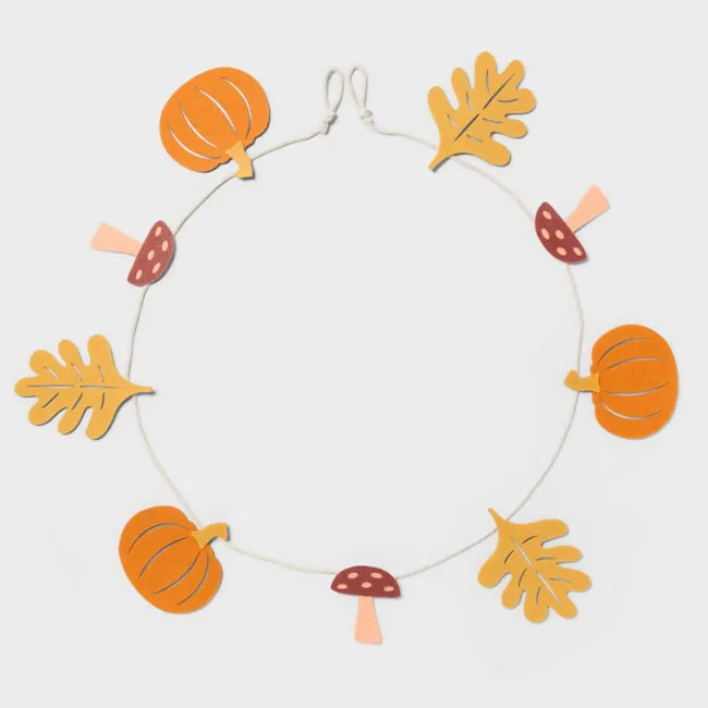 Festive felt harvest banner for Thanksgiving celebrations.