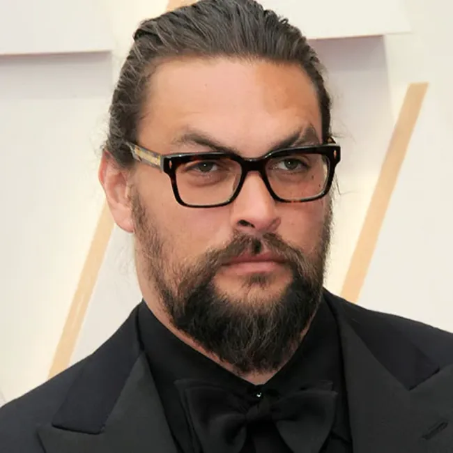 Jason Momoa posing for a stylish portrait