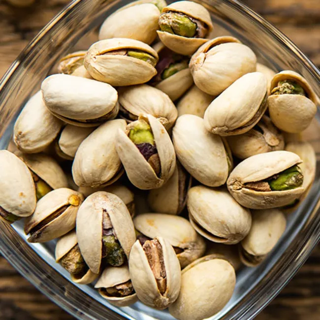 Elegant pistachio dessert with decorative elements