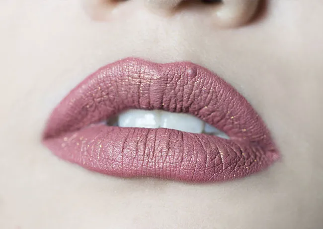 woman-wearing-rose-mauve-lipstick