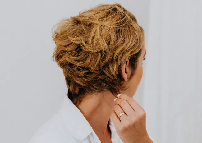 woman-touching-short-hair