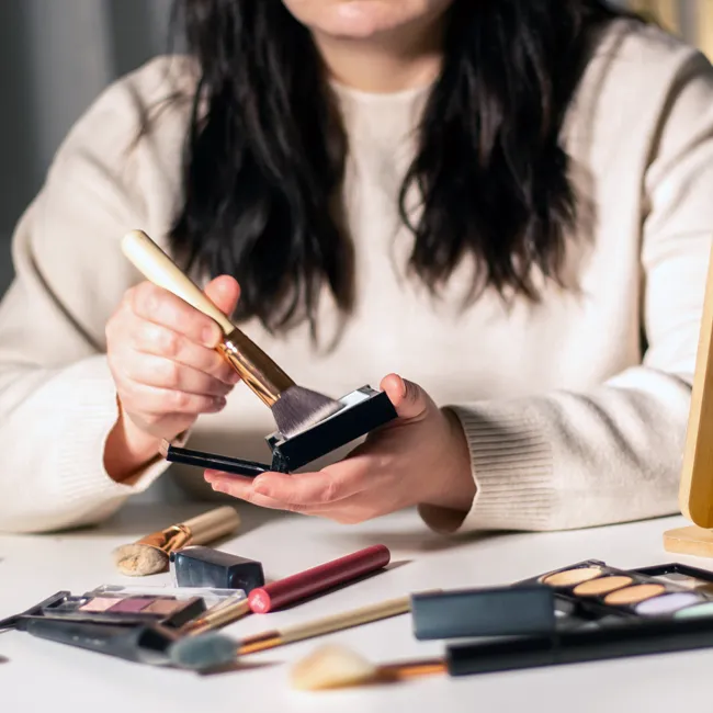 woman-surrounded-makeup